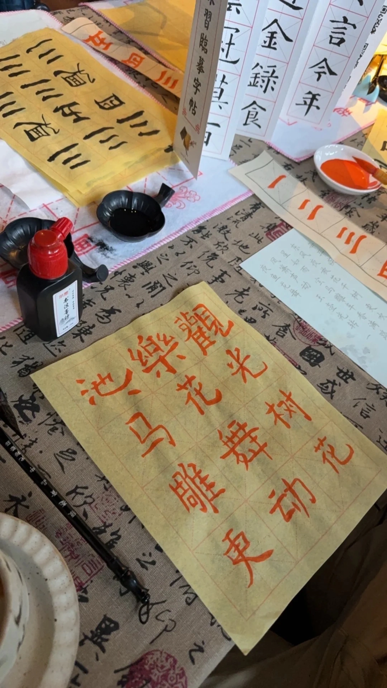 foreign tourist completed calligraphy work.webp