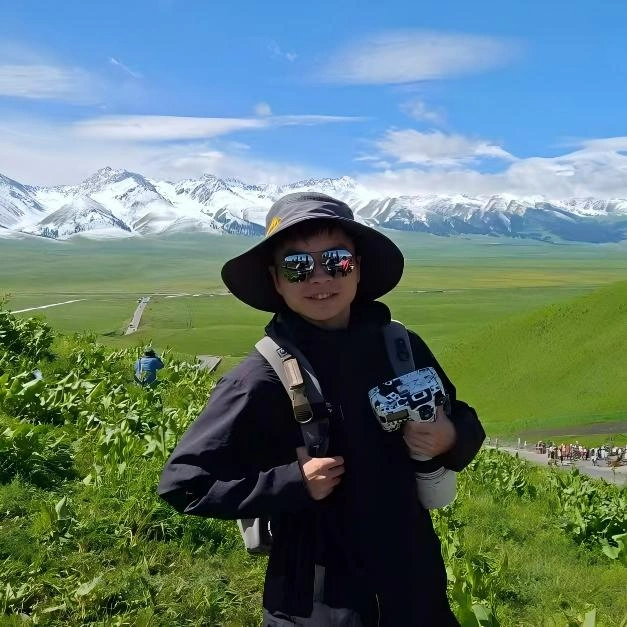 Brown exploring remote travel routes and landscapes in Western China