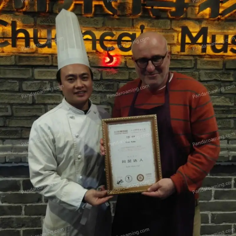 A traveler holding a Sichuan Cuisine Master sign during a cooking experience in Chengdu