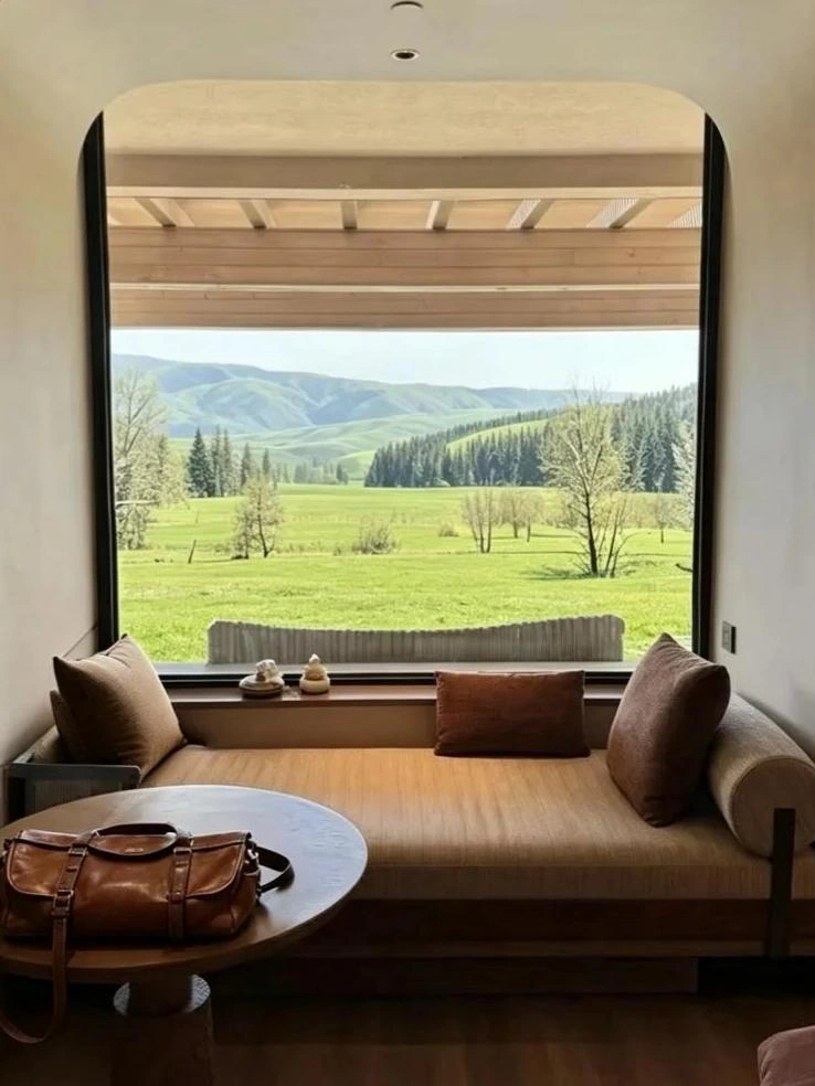 Hotel room overlooking open grasslands in Western China