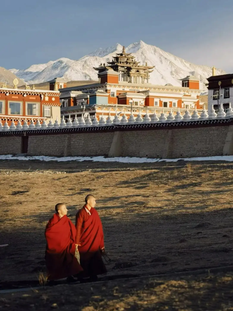Muya Temple with two monks in front of the monastery