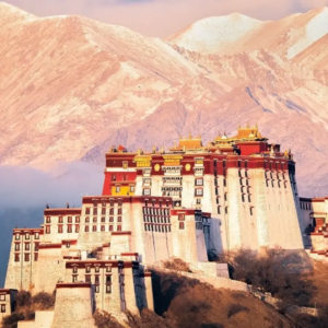 Sunrise light over the Potala Palace in Lhasa with soft Himalayan mountain atmosphere
