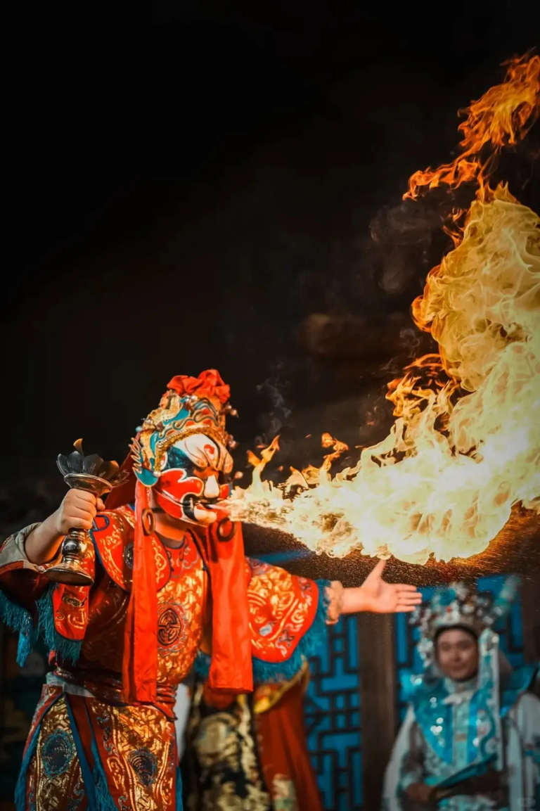 Sichuan opera face-changing performance with fire-breathing act