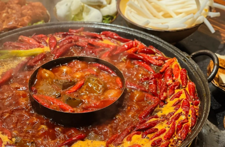 Traditional spicy Sichuan hotpot with chili and local ingredients