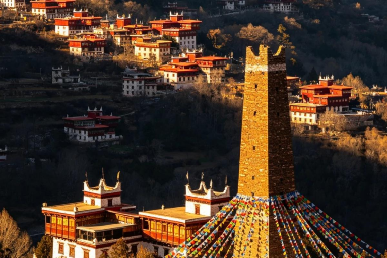 Scenic view of Jiaju Tibetan Village surrounded by mountains in Danba