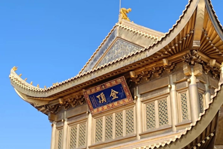 Golden Summit Buddhist temple surrounded by mountain scenery on Mount Emei
