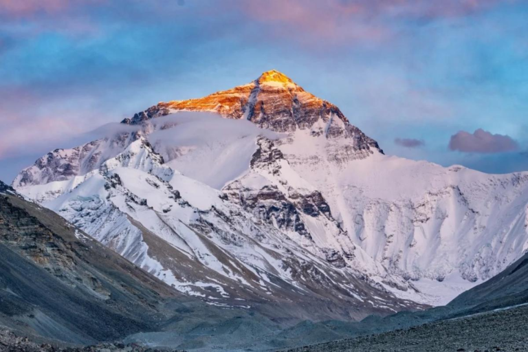 Mount Everest rising above the Himalayan mountains in Tibet
