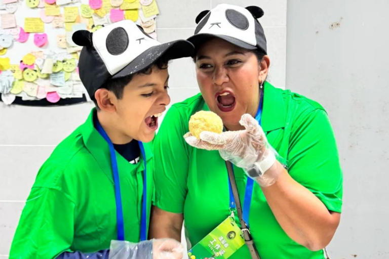 Traveler participating in a giant panda volunteer experience at a panda base in Sichuan