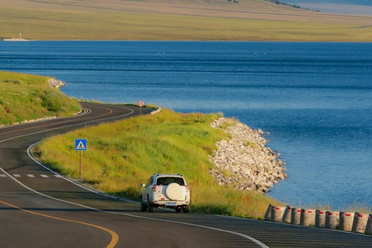 Scenic road beside Sayram Lake in Xinjiang