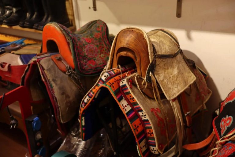 Handmade leather crafts displayed in Songpan, Sichuan