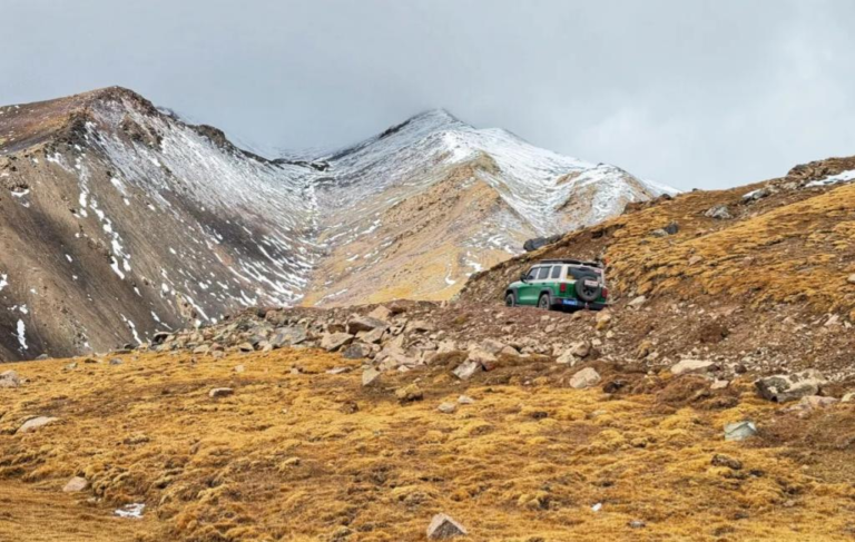 High-altitude landscape near Yushu with alpine hills and grasslands in Sanjiangyuan, Qinghai China