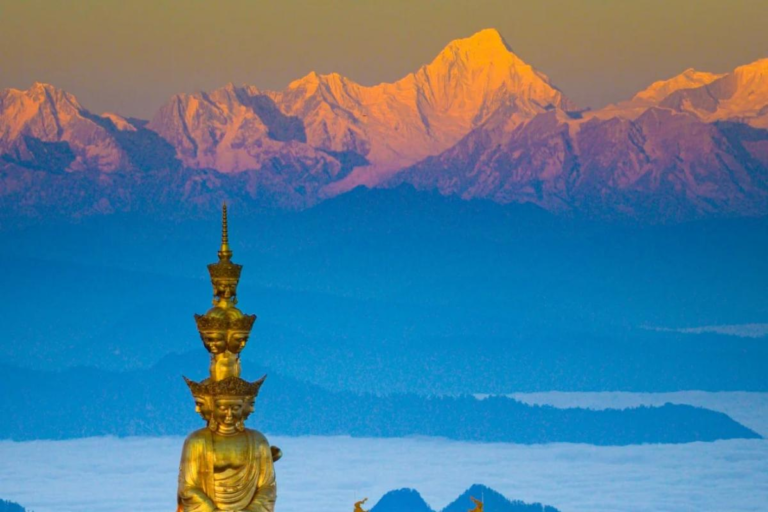 View from the Golden Summit of Mt. Emei toward distant snow mountains