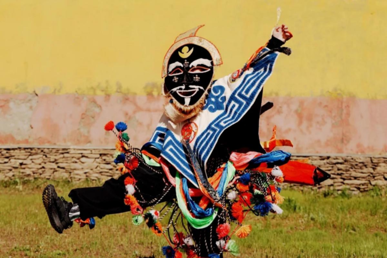 Masked performers during a traditional Tibetan opera experience